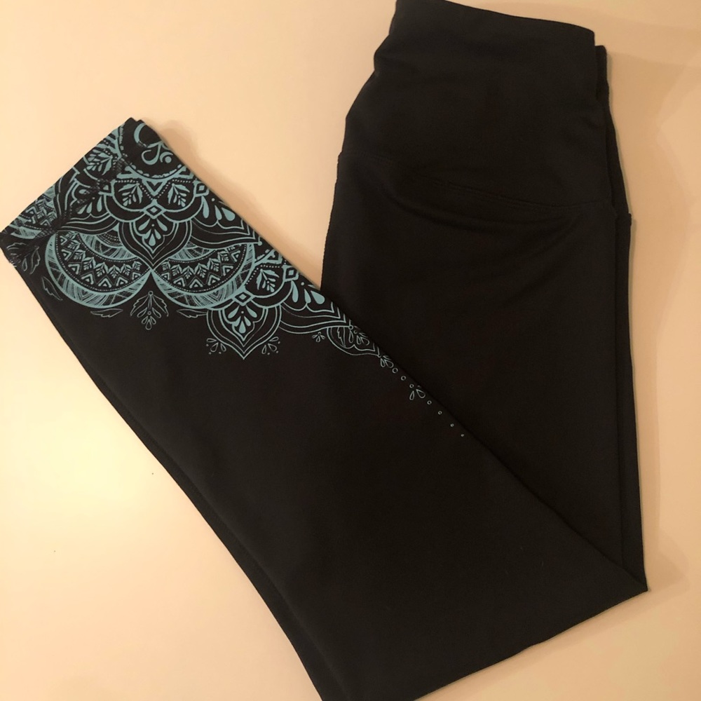 GAIAM leggings. Black with graphic detailed hem.